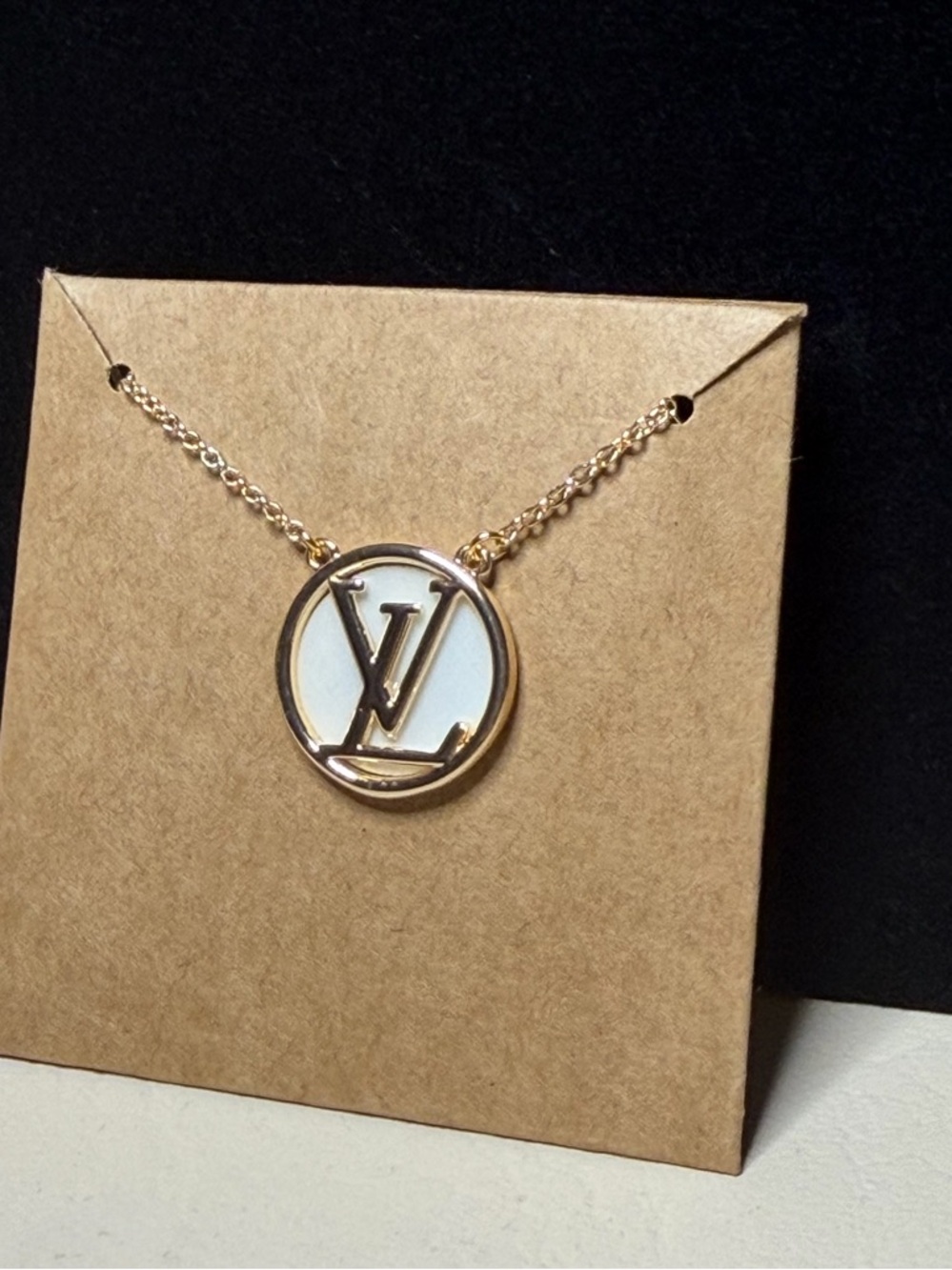LV Lettered White Embossed Monogram Gold tone Chain and Pendant